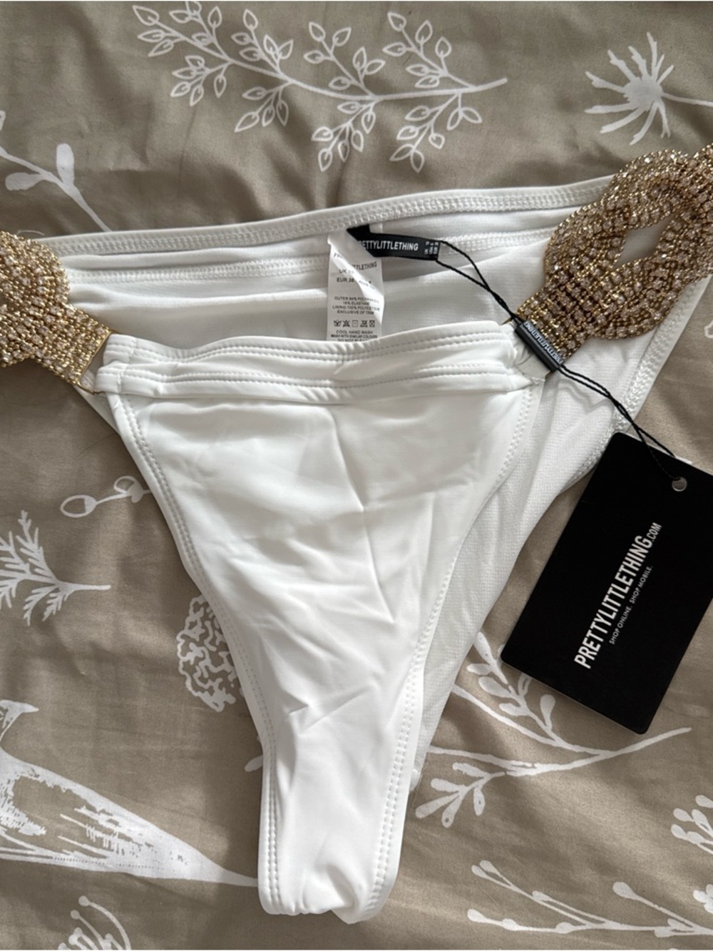 PrettyLittleThing White Swim Bottoms with Gold Accent